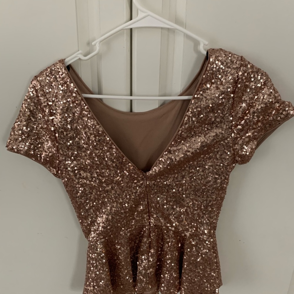 Sequence rose gold top.